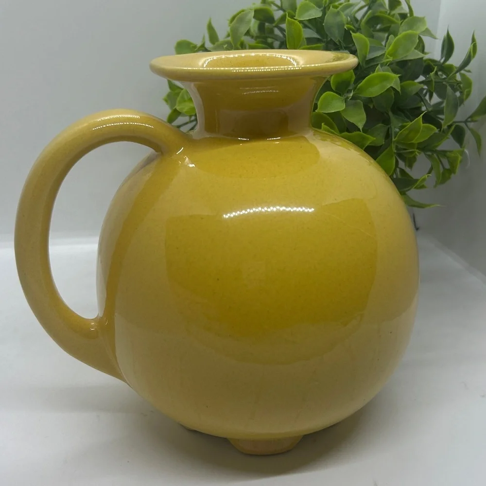 Frankoma Pottery Yellow MCM #82 Carafe dating back to the 1950s.